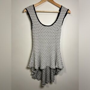 You Are Not Alone- Black and white peblum top